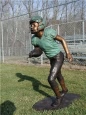 Boy Running With Football bronze statue